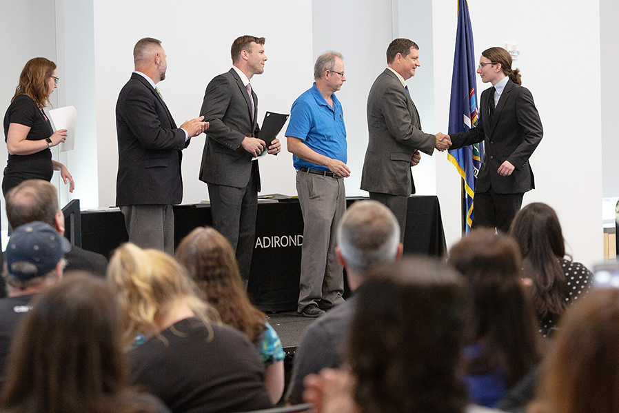 A spring graduation ceremony recognized students who completed courses as part of the Early College Career Academy.