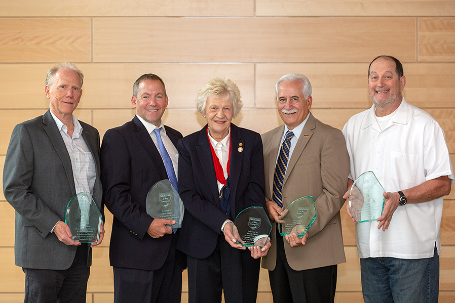 SUNY Adirondack recognized Trailblazer honorees (from left to right) Dennis Harris ’96, Brett Lange 92‘, Sarah Ghent ’80, Rich Johns ’68 and Steve Harmon ’76 during a Sept. 28 event.