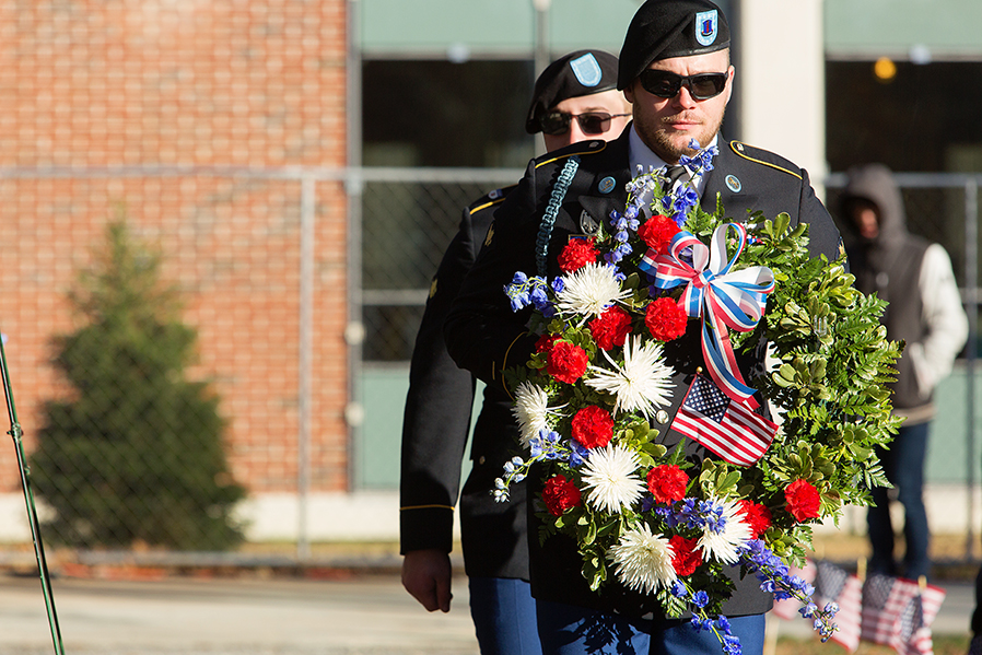Jesse Vise, front, and Bradley Perry of the SUNY Adirondack Veterans Club take part in the presentation of the wreath during a Veterans Day ceremony on the college campus.