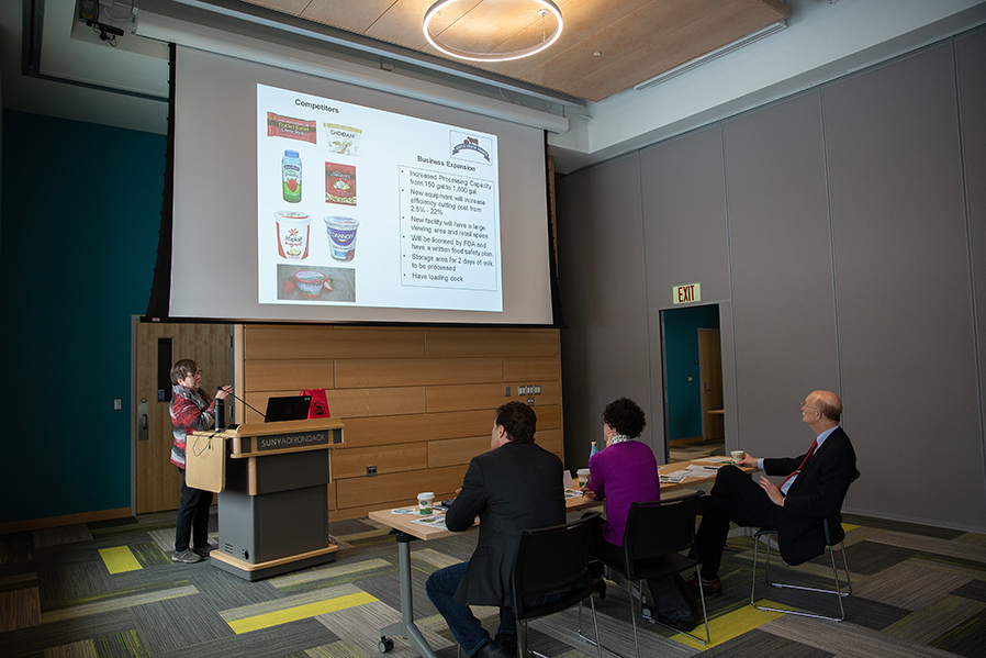A panel of judges listens to a proposal from Argyle Cheese farmer during SUNY Adirondack’s inaugural Business Plan Competition.