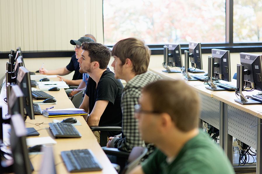 Students get hands-on experience during a computer course included in the Information Security degree program curriculum, which introduces them to secure coding techniques, information assurance and network security.