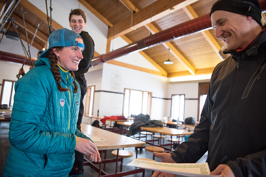 SUNY Adiorndack Professor Clint McCarthy awards a student a Telemark Certification at Gore Mountain.