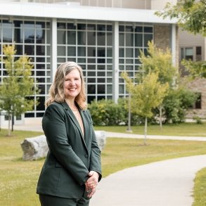 Anastasia Urtz, J.D., is seen outside the Residence Hall on campus.