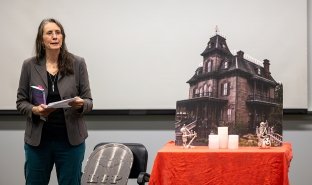 English Professor Lale Davidson reads from her works at a Writers Project series event.