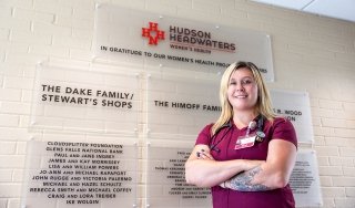 SUNY Adirondack alumna Logan Hayes is seen at Hudson Headwaters Health Network, where she is a nurse.