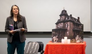 English Professor Lale Davidson reads from her works at a Writers Project series event.