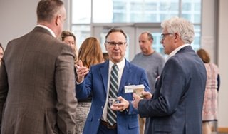 Regional executives speak at an on-campus event