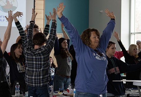 Participants at a Suicide Awareness Walk cheer