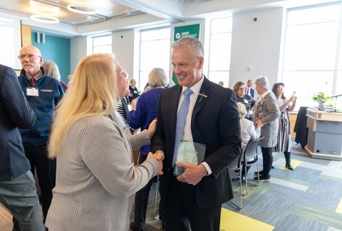 Sheriff Jim LaFarr greets a friend at the 2025 Trailblazers induction ceremony.