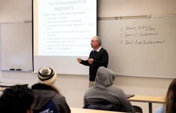 Professor John Arpey, J.D., teaches a class in Business Law