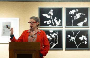 Professor Nancy White speaks at a Writers Project event