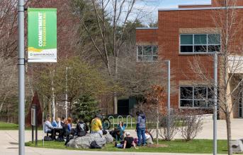 A group of students are seen outside on SUNY Adirondack's Queensbury campus