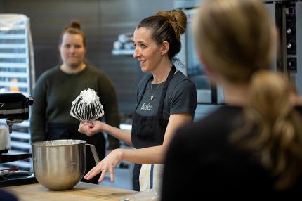 Andrea Maranville offers a baking demonstration.