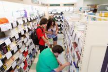 Students shop for school supplies at the college bookstore.