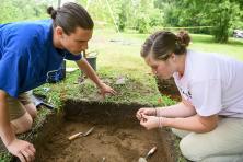 students at archaeology dig